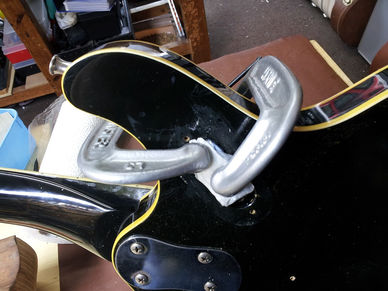 Guitar body clamped during structural repair