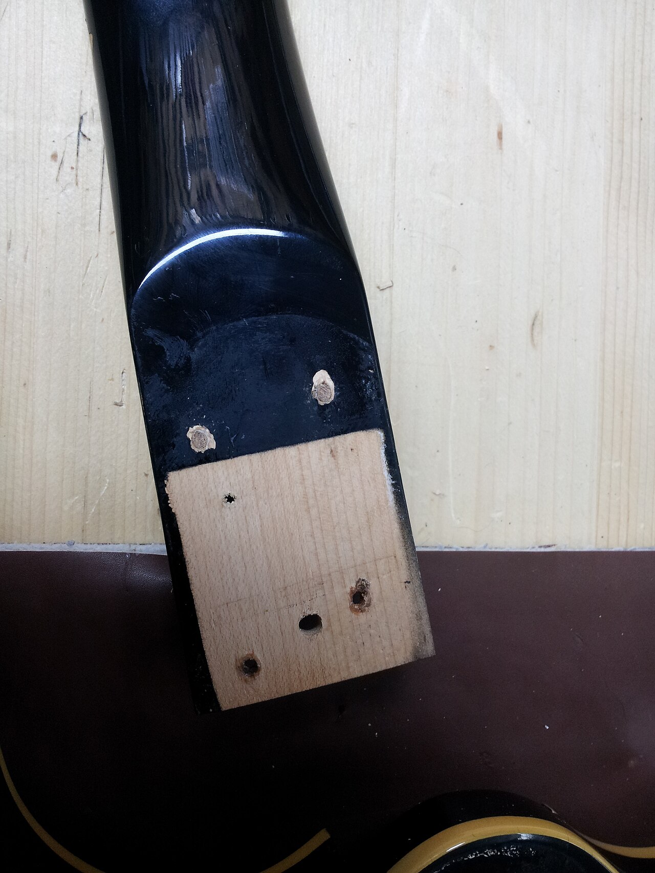 Reinforced guitar neck repair with dowels installed